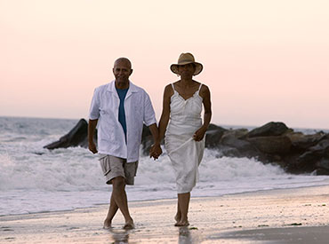 Couple walking on beach